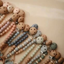 Mushie Hera Silicone Pacifier Clip, Faux Wood -Baby Product Specialty Store mushie hera silicone pacifier clip faux woodmussmpc3007anb babyanb baby 267466